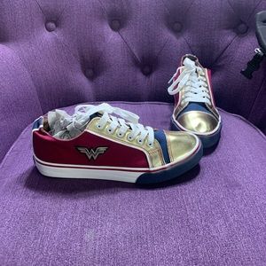 Wonder Woman Sneakers brand new , never worn. Colors Blue,Red,Gold. Super cute.